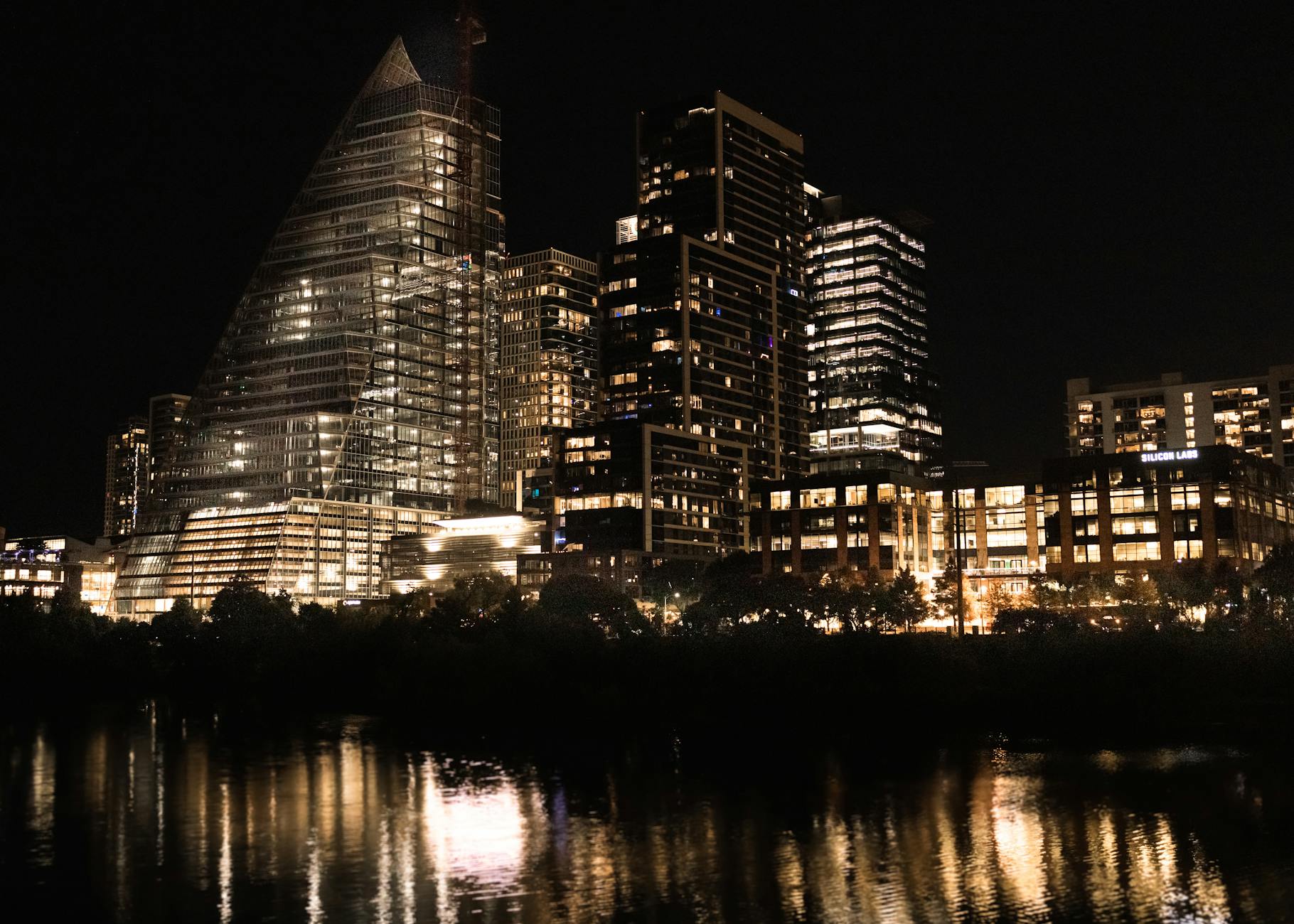 Austin, Texas skyline over Lady Bird Lake at dusk